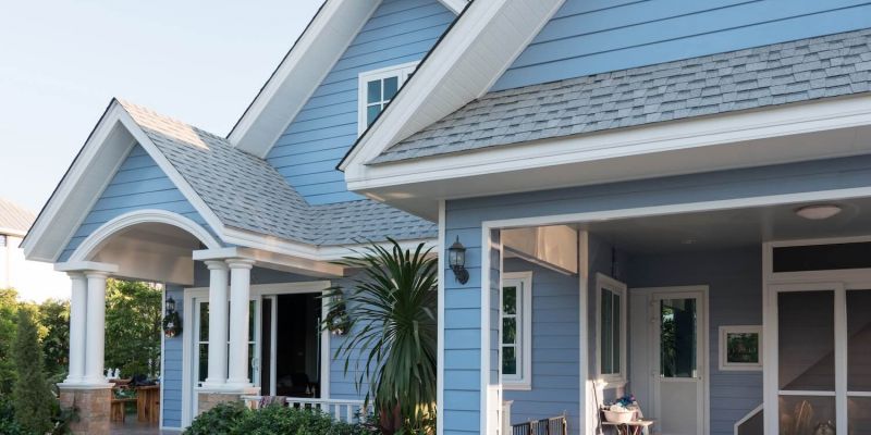 exterior of a nice blue single family home